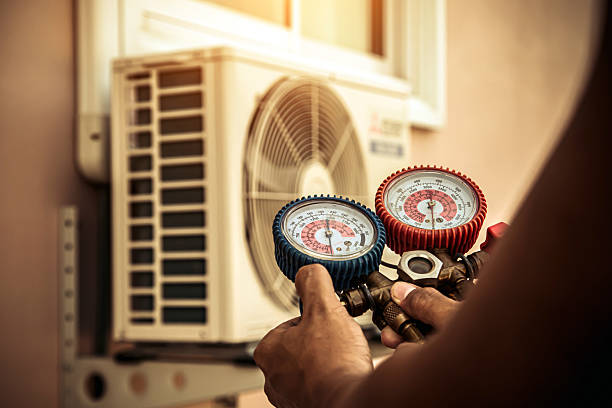 Professional Hvac Maintenance technician working in Rainier, WA